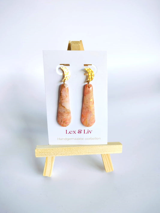 Bronskleurige druppel met maantjes