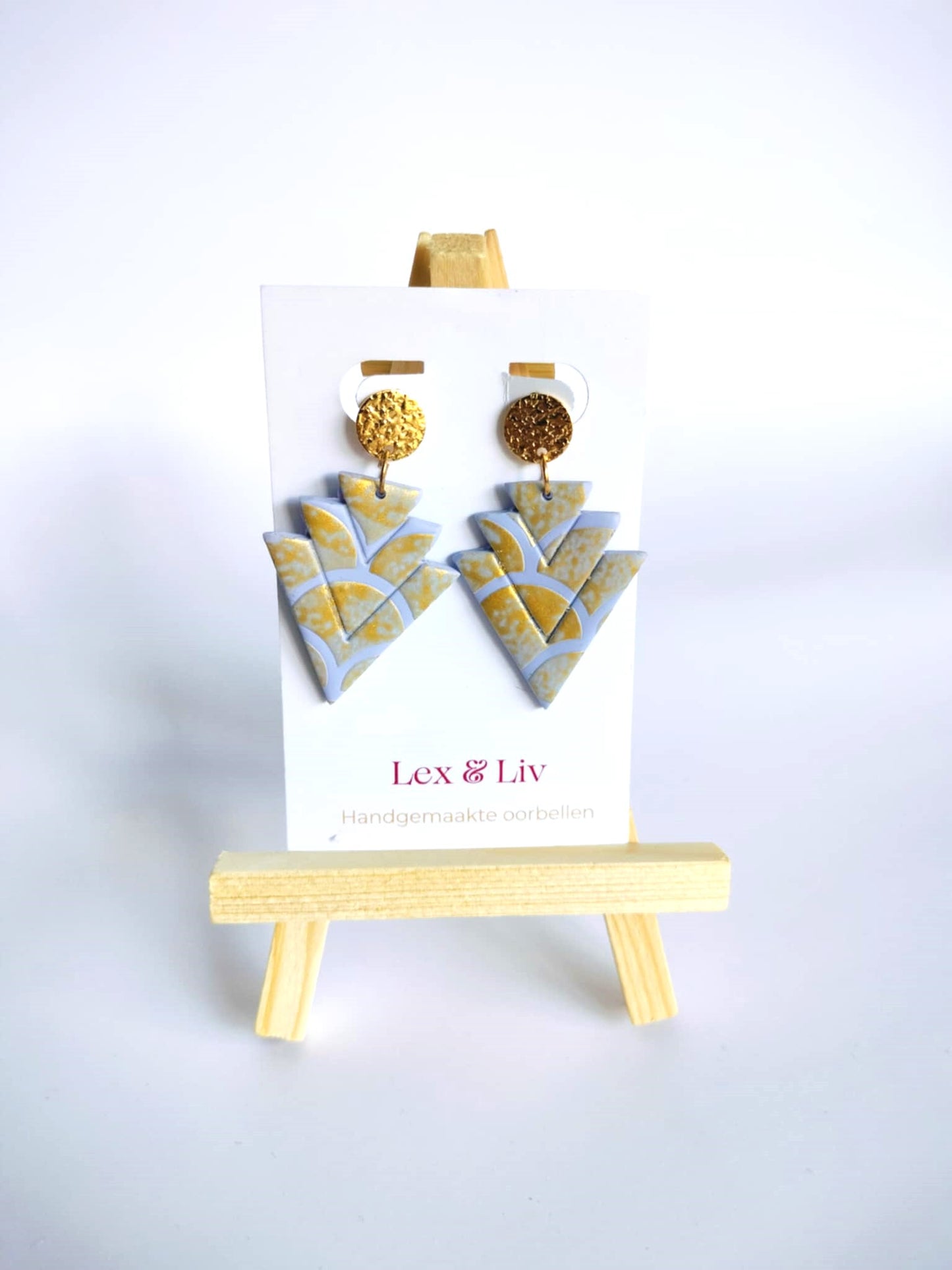 Paarse driehoek met gouden accent