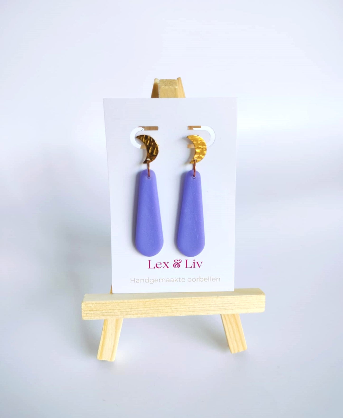 Paarse druppel met gouden maan